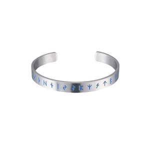 Close-up of silver titanium steel viking bracelet with blue glowing rune engravings