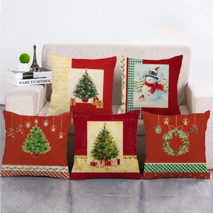 Set of five linen Christmas pillow covers with festive tree and snowman patterns
