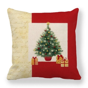 Detail of Christmas linen pillowcase featuring festive tree and gift box graphics