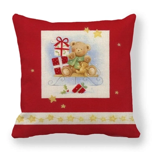 Close-up of a festive Christmas linen pillowcase featuring teddy bears on a red background