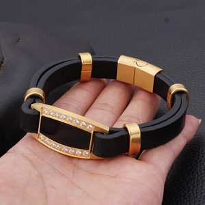 Men's double-layered black leather bracelet with gold-plated zircon metal plate on hand