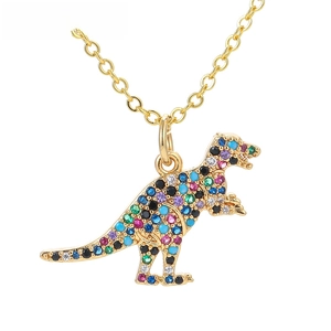 Detailed close-up of golden T-Rex dinosaur pendant necklace with colorful zircon stones