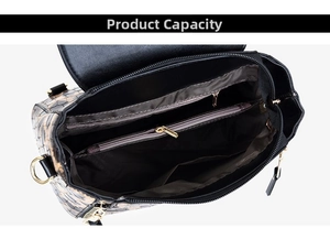 Detail view of the multi-layer interior capacity and golden zipper of this black handbag