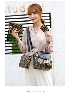 Detail view of leopard print 4-piece handbag set including backpack and crossbody bag