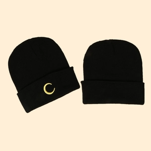 Black knit beanie with yellow crescent moon embroidery, cuffed winter hat for men and women