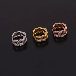 Set di anelli geometrici a maglia cubana in argento, oro e oro rosa con zirconi