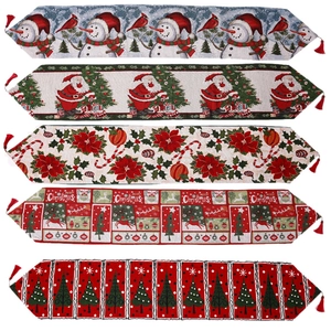Christmas table runner collection featuring Santa and Reindeer patterns with red tassels