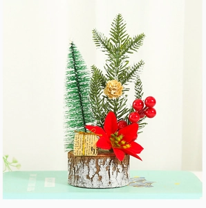 Miniature Christmas tree desk decor with red berries, pinecones and natural wood base