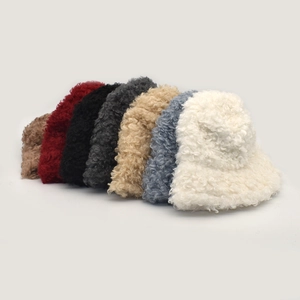 Winter faux lambswool bucket hats for women in multiple warm colors with plush texture