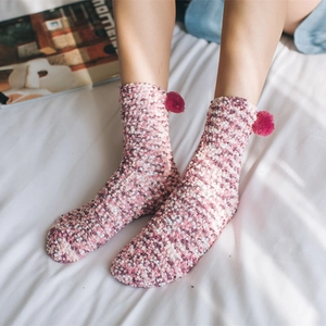 Pink and purple coral fleece warm socks with cute red pom-poms for winter home wear