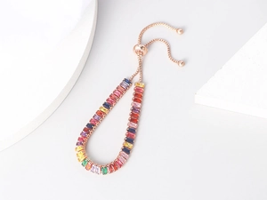 Detailed shot of rainbow zircon bolo bracelet with rose gold adjustable chain