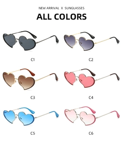 Détail de lunettes de soleil en forme de cœur en six couleurs avec monture en métal