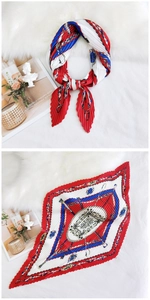 Detail of red white and blue pleated diamond scarf with geometric chain pattern