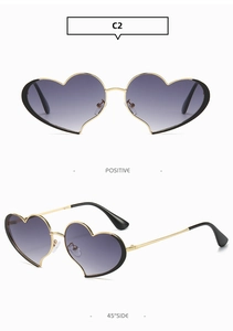 Vue détaillée de lunettes de soleil en cœur avec monture dorée et verres dégradés