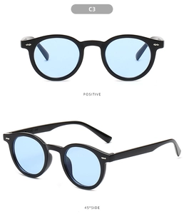 Dual view of round frame sunglasses in black with blue lenses and silver rivet detail
