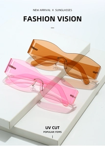 Detail view of Y2K rimless curved sunglasses with UV cut lenses and metal nose pads