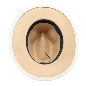 Detail of wool fedora interior showing camel felt, black sweatband and adjustable drawstring