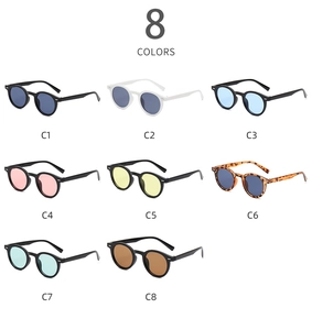 Detail display of small round frame sunglasses in eight colors with double dot rivets
