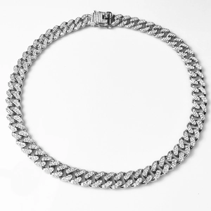 Detail of 13mm silver Cuban link chain with micro-pave crystals and square clasp