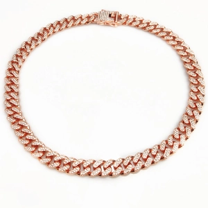 Close-up of 13mm rose gold iced out Cuban link chain with pave diamonds and safety clasp