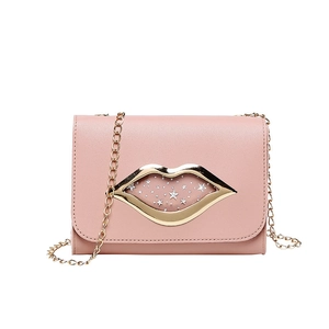 Pink PU leather crossbody bag with golden lip-shaped buckle and star glitter detailing