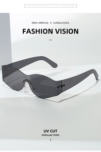 Close-up of Y2K rimless sunglasses with grey lenses and stylish curved wave edges