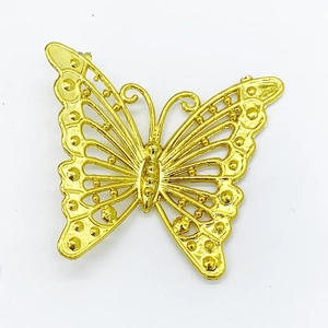 Golden plastic butterfly ornament with hollowed wings for Christmas tree decoration