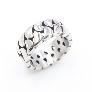 Unisex silver stainless steel ring featuring textured interlocking scales design