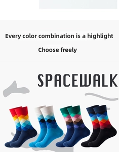 Set of four cotton mid-calf socks with colorful argyle patterns and ribbed cuffs