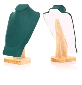 Detail of dark green velvet necklace stand with solid wood base for jewelry display