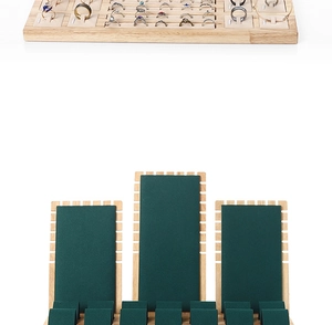 Bamboo wood jewelry display set with emerald green velvet ring tray and necklace stand