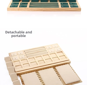 Detail of detachable bamboo jewelry display set with velvet inserts for rings and necklaces