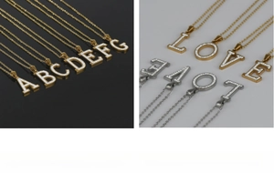 Close-up of 18k gold plated letter pendants with sparkling micro-pave rhinestone inlay