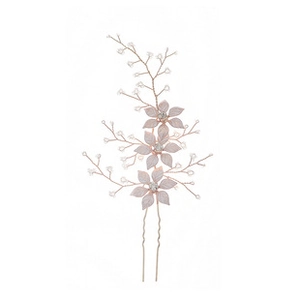 Detail of rose gold flower hair comb with white pearls and sparkling crystals for brides