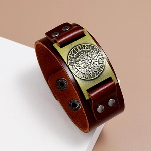 Brown leather Viking bracelet featuring bronze Vegvisir compass and Nordic rune engraving