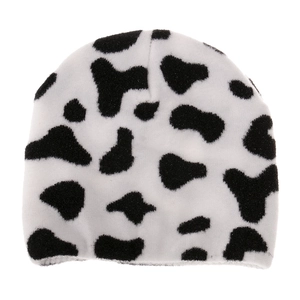 Winter striped knit beanie hat with classic black and white cow print pattern