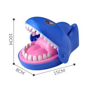 Blue shark biting game toy showing dimensions of 15cm length, 8cm width, and 10cm height