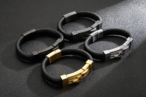 Macro shot of men's braided leather bracelets with four metallic magnetic clasp finishes