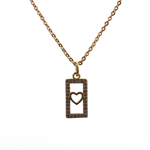 Detail of gold necklace with rectangular pendant featuring CZ stones and heart cutout