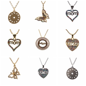 Multiple zircon heart, butterfly, and zodiac necklaces in gold, silver and black