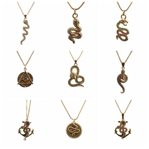 Detailed grid showing nine gold micro-pave zircon pendants including snakes and mystic eyes