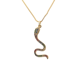 Detail of gold snake pendant necklace with multi-colored cubic zirconia stones