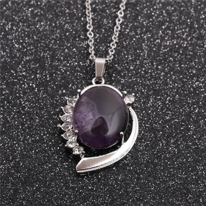 Stainless steel necklace with moon crescent pendant and dark purple oval gemstone
