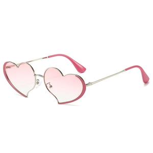 Lunettes de soleil cœur à la mode avec verres roses dégradés et monture en métal femme