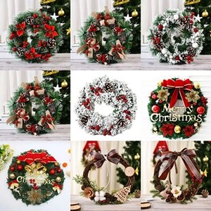 Macro display of assorted Christmas wreath styles with berries, bows, and festive decorations