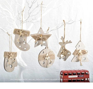 Wooden Christmas tree hanging ornaments set with star, reindeer and festive decor.