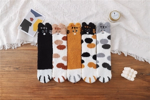 Close-up of five pairs of plush coral fleece cat socks with 3D ears and paw embroidery
