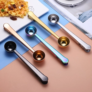 Set of five stainless steel coffee measuring spoons with bag clip in various colors