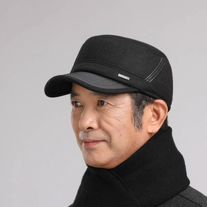 Detail of men's winter flat top cap with metal SPORT badge and matching cashmere scarf