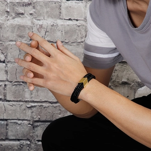Double-layered braided leather bracelet for men featuring a gold stainless steel magnetic clasp